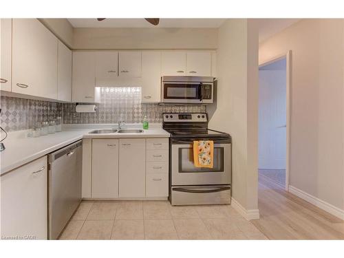 27-3085 Kingsway Drive, Kitchener, ON - Indoor Photo Showing Kitchen With Stainless Steel Kitchen With Double Sink