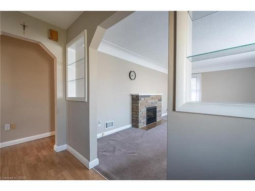 173 West 23Rd Street, Hamilton, ON - Indoor Photo Showing Other Room With Fireplace
