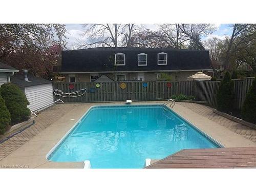 2232 Queensway Street, Burlington, ON - Outdoor With In Ground Pool With Backyard