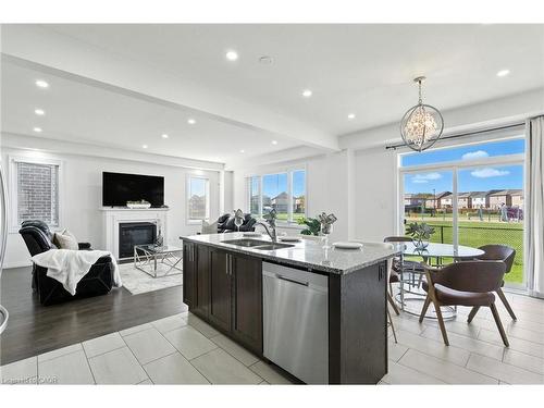 409 Freure Drive, Cambridge, ON - Indoor Photo Showing Kitchen With Fireplace With Double Sink