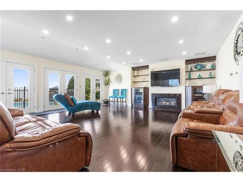 1073 N Service Road, Hamilton, ON - Indoor Photo Showing Living Room With Fireplace