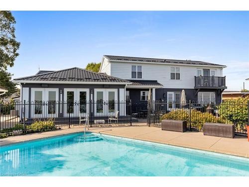 1073 N Service Road, Hamilton, ON - Outdoor With In Ground Pool With Deck Patio Veranda