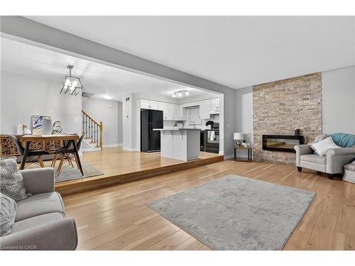 70 Cannes Street, Kitchener, ON - Indoor Photo Showing Living Room With Fireplace