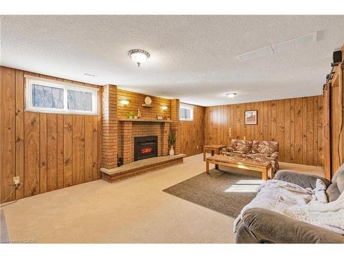 68 Hixon Road, Hamilton, ON - Indoor Photo Showing Living Room With Fireplace