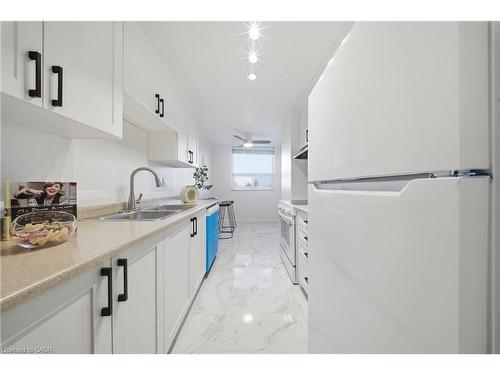512-3 Lisa Street, Brampton, ON - Indoor Photo Showing Kitchen With Double Sink