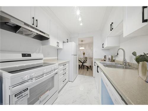 512-3 Lisa Street, Brampton, ON - Indoor Photo Showing Kitchen With Double Sink