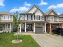 76 Mcallistar Drive, Binbrook, ON  - Outdoor With Deck Patio Veranda With Facade 