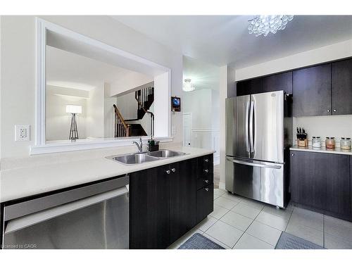 76 Mcallistar Drive, Binbrook, ON - Indoor Photo Showing Kitchen With Double Sink