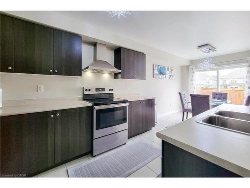 76 Mcallistar Drive, Binbrook, ON - Indoor Photo Showing Kitchen With Double Sink