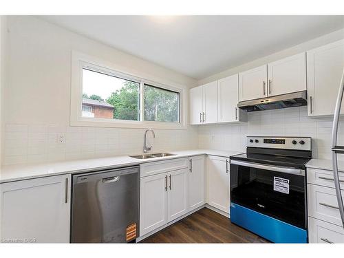 59 Woodman Drive, Hamilton, ON - Indoor Photo Showing Kitchen With Stainless Steel Kitchen With Double Sink