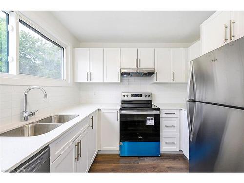 59 Woodman Drive, Hamilton, ON - Indoor Photo Showing Kitchen With Stainless Steel Kitchen With Double Sink
