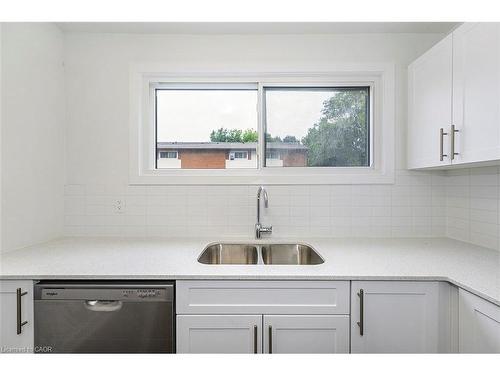 59 Woodman Drive, Hamilton, ON - Indoor Photo Showing Kitchen With Double Sink