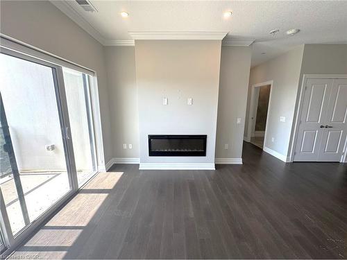 1003-1880 Gordon Street, Guelph, ON - Indoor Photo Showing Living Room With Fireplace