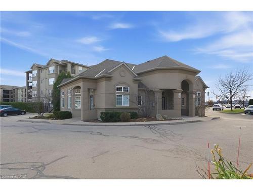 409-2035 Appleby Line, Burlington, ON - Outdoor With Facade