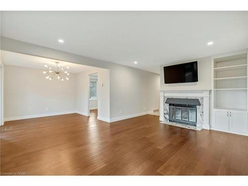 3-1513 Upper Middle Road, Burlington, ON - Indoor Photo Showing Living Room With Fireplace