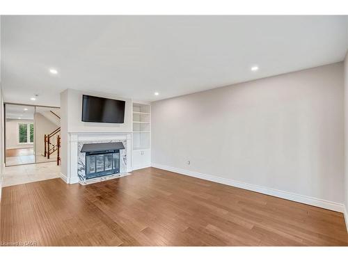 3-1513 Upper Middle Road, Burlington, ON - Indoor With Fireplace