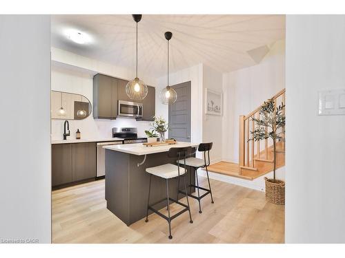 83-1317 Leriche Way, Milton, ON - Indoor Photo Showing Kitchen With Upgraded Kitchen