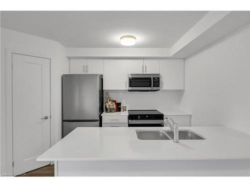 81-940 David Street, Wellington, ON - Indoor Photo Showing Kitchen With Double Sink
