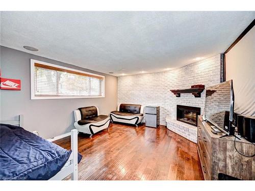288 Salisbury Avenue, Cambridge, ON - Indoor Photo Showing Bedroom With Fireplace