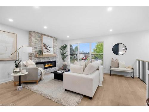 15 Mellenby Street, Hamilton, ON - Indoor Photo Showing Living Room With Fireplace