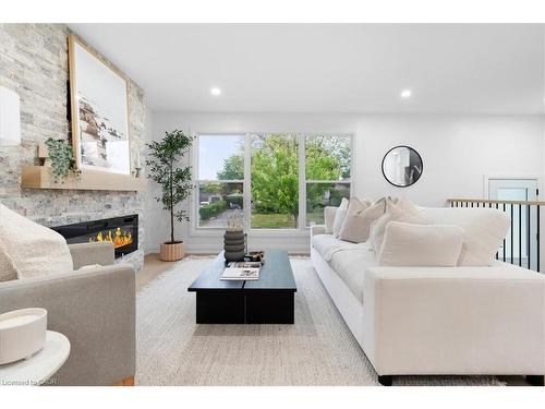 15 Mellenby Street, Hamilton, ON - Indoor Photo Showing Living Room With Fireplace