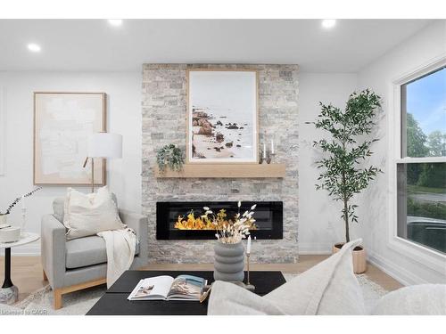 15 Mellenby Street, Hamilton, ON - Indoor Photo Showing Living Room With Fireplace