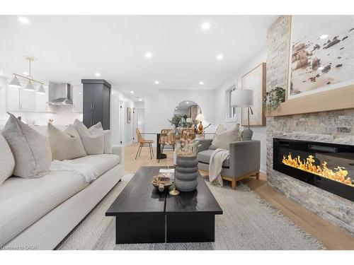15 Mellenby Street, Hamilton, ON - Indoor Photo Showing Living Room With Fireplace