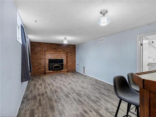 102 Dundee Drive, Caledonia, ON - Indoor Photo Showing Living Room With Fireplace