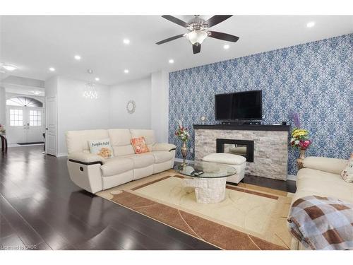 16 Weathering Highway, Stoney Creek, ON - Indoor Photo Showing Living Room With Fireplace