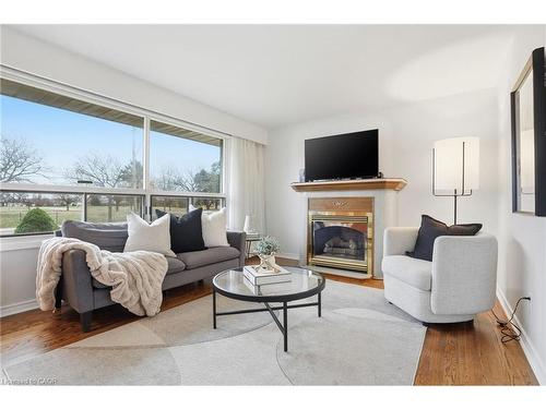 131 Nash Road N, Hamilton, ON - Indoor Photo Showing Living Room With Fireplace