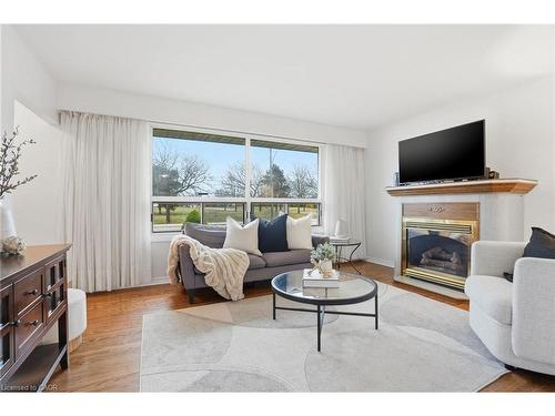 131 Nash Road N, Hamilton, ON - Indoor Photo Showing Living Room With Fireplace