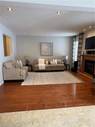 456 Westhaven Street, Waterloo, ON - Indoor Photo Showing Living Room With Fireplace