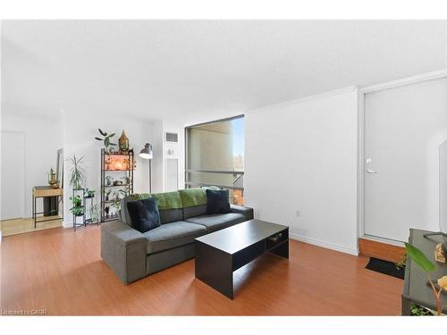 502-222 Jackson Street W, Hamilton, ON - Indoor Photo Showing Living Room With Fireplace