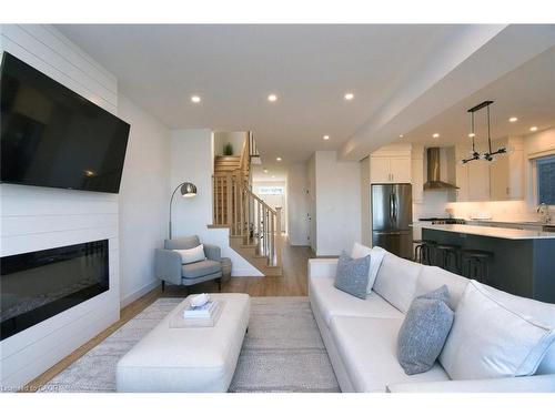100 Bedrock Drive, Hamilton, ON - Indoor Photo Showing Living Room With Fireplace