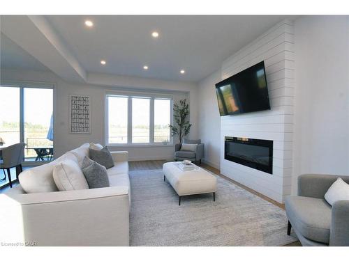 100 Bedrock Drive, Hamilton, ON - Indoor Photo Showing Living Room With Fireplace