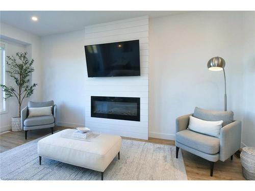 100 Bedrock Drive, Hamilton, ON - Indoor Photo Showing Living Room With Fireplace