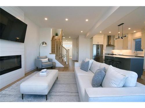 100 Bedrock Drive, Hamilton, ON - Indoor Photo Showing Living Room With Fireplace