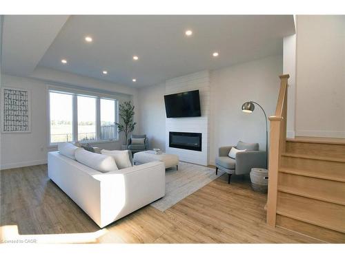 100 Bedrock Drive, Hamilton, ON - Indoor Photo Showing Living Room With Fireplace