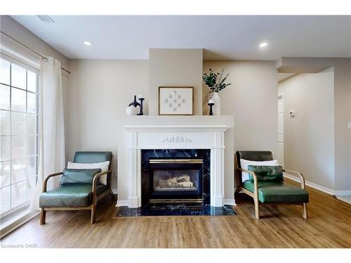 2-2333 Walker'S Line, Burlington, ON - Indoor Photo Showing Living Room With Fireplace