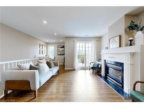 2-2333 Walker'S Line, Burlington, ON - Indoor Photo Showing Living Room With Fireplace