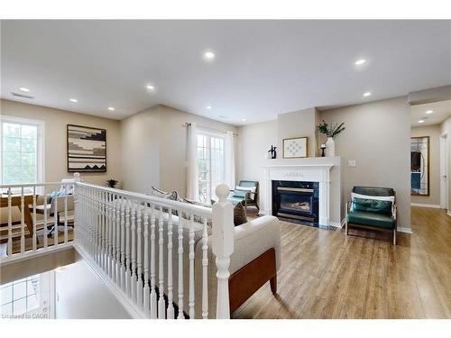 2-2333 Walker'S Line, Burlington, ON - Indoor With Fireplace