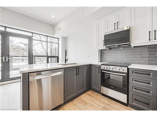 305-555 Sanatorium Road, Hamilton, ON - Indoor Photo Showing Kitchen With Stainless Steel Kitchen With Double Sink With Upgraded Kitchen