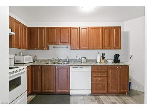 209-135 James Street S, Hamilton, ON - Indoor Photo Showing Kitchen With Double Sink