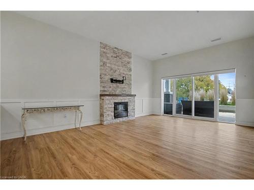 006-39 Sister Varga Terrace, Hamilton, ON - Indoor Photo Showing Living Room With Fireplace