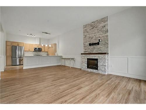 006-39 Sister Varga Terrace, Hamilton, ON - Indoor With Fireplace