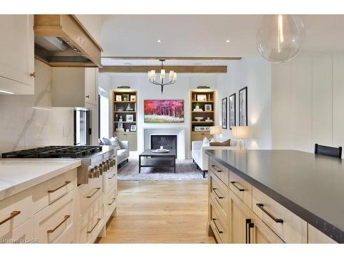1489 Mildmay Court, Mississauga, ON - Indoor Photo Showing Kitchen With Fireplace
