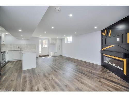 Lower-550 Rush Meadow Crescent, Kitchener, ON - Indoor With Fireplace