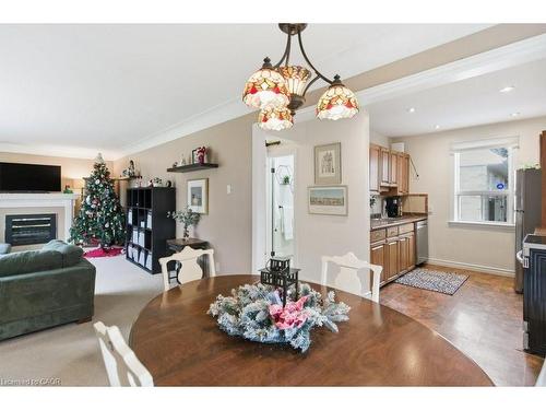 52 Sylvia Crescent, Hamilton, ON - Indoor Photo Showing Dining Room With Fireplace