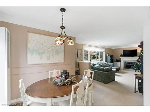 52 Sylvia Crescent, Hamilton, ON - Indoor Photo Showing Dining Room With Fireplace