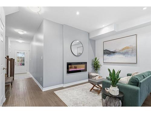 7-21 Madonna Drive, Hamilton, ON - Indoor Photo Showing Living Room With Fireplace